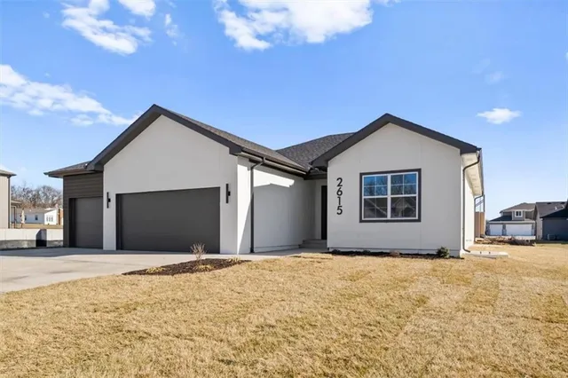 $527,000 | 2615 Southwest Tracker Lane, Lee's Summit, MO 64082