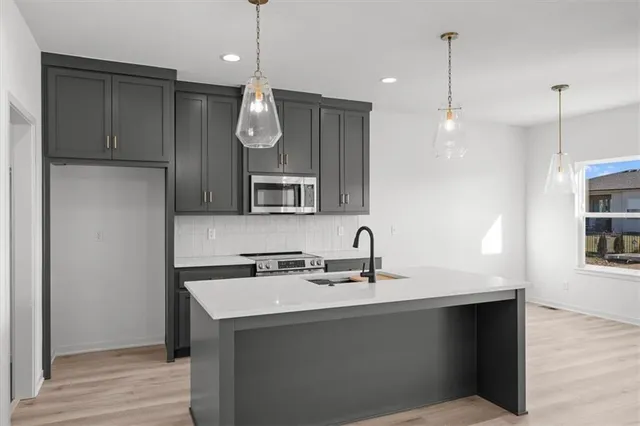 $527,000 | 2615 Southwest Tracker Lane, Lee's Summit, MO 64082