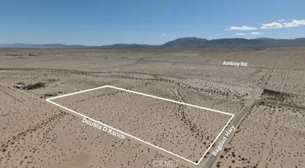 a view of a mountain from a lake view