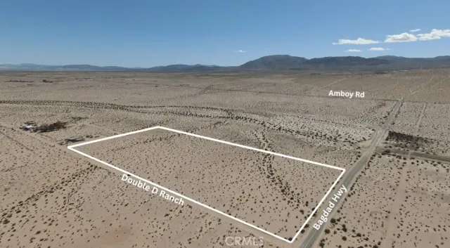 a view of a mountain from a lake view