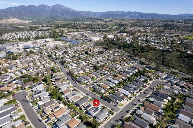 an aerial view of residential house with outdoor space