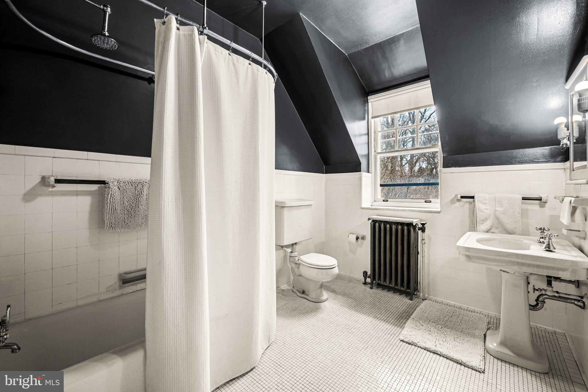 1018 Beech Road Wallingford, PA 19086 - Photo 34 of 66 a bathroom with a sink a toilet and shower