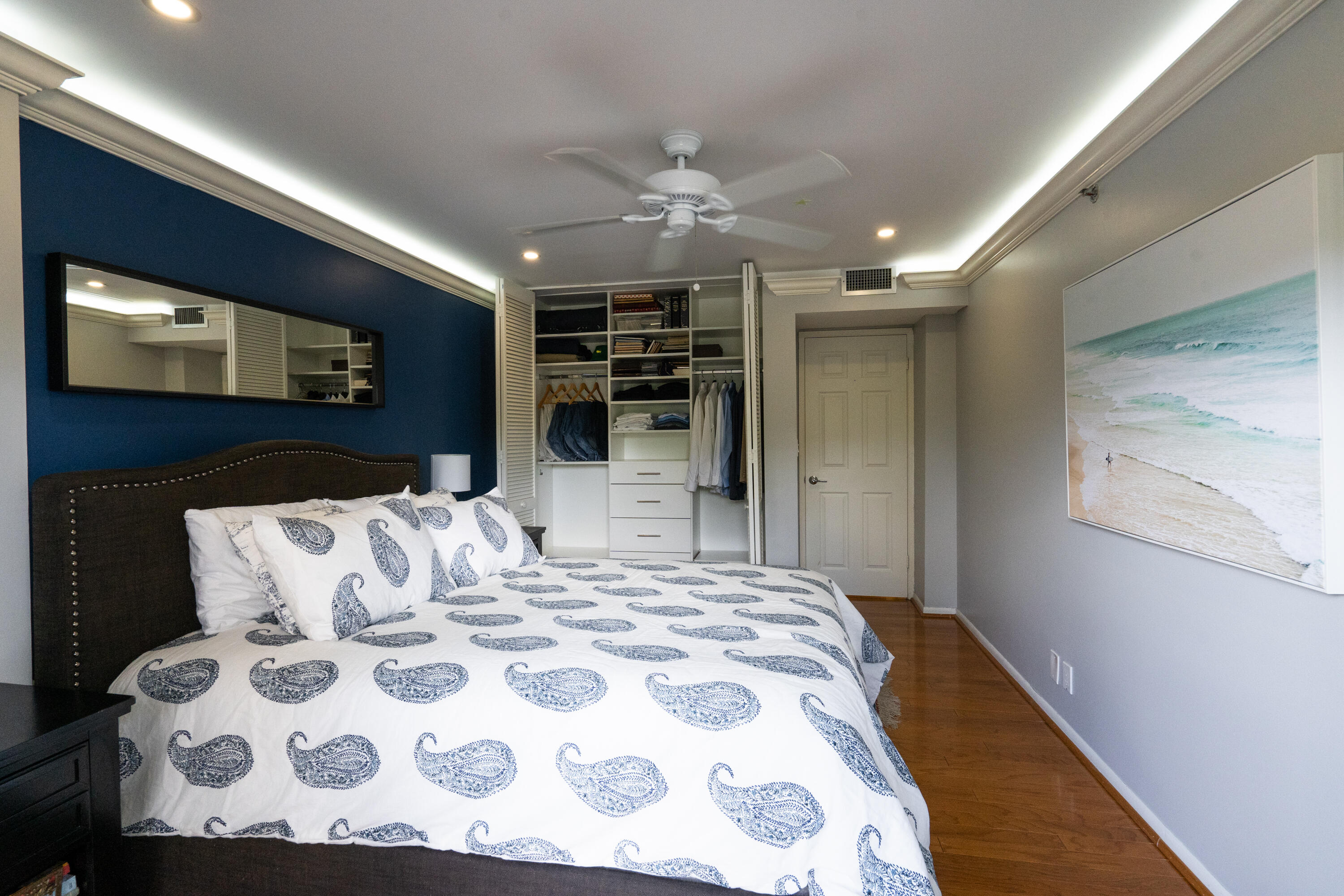 23200 Camino Del Mar, Unit 301 Boca Raton, FL 33433 - Photo 18 of 22 a bedroom with a large bed and a tv