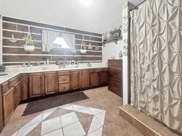 a kitchen with stainless steel appliances granite countertop a stove and a sink