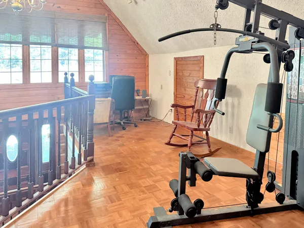 a view of a room with gym equipment