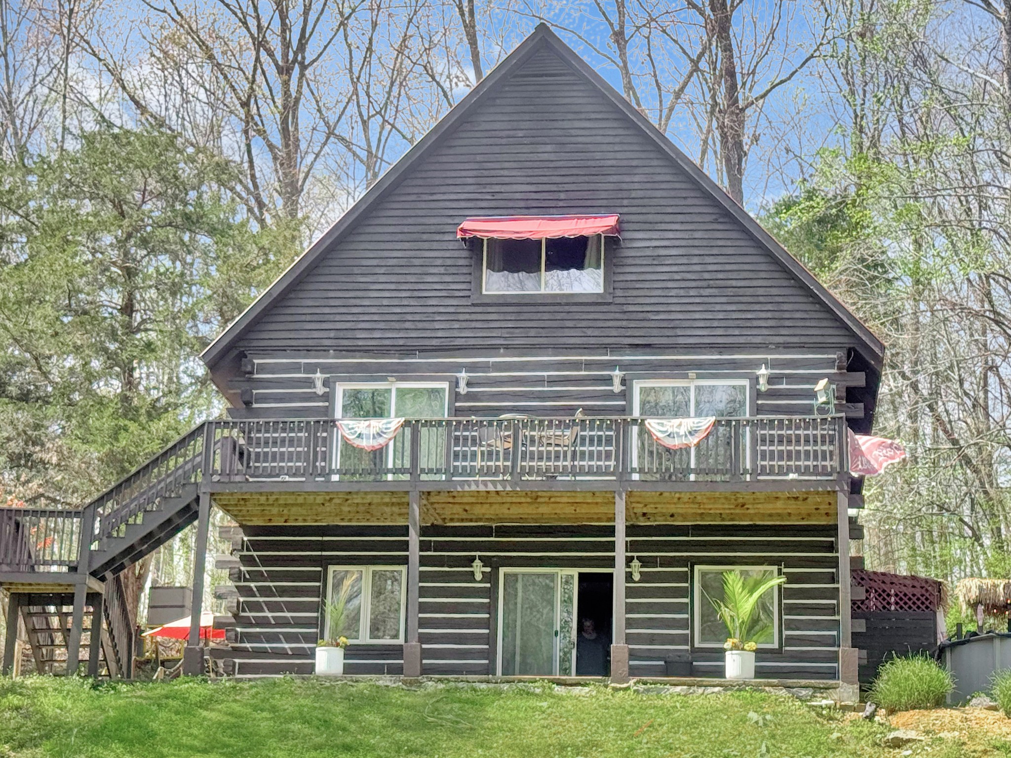 480 Hickman Shores Road Dover, TN 37058 - Photo 3 of 44 a view of a house with a yard