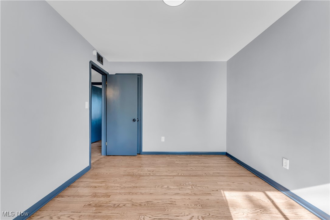 5235 State Road, Unit 3 Cleveland, OH 44134 - Photo 17 of 21 Empty room with light hardwood / wood-style flooring