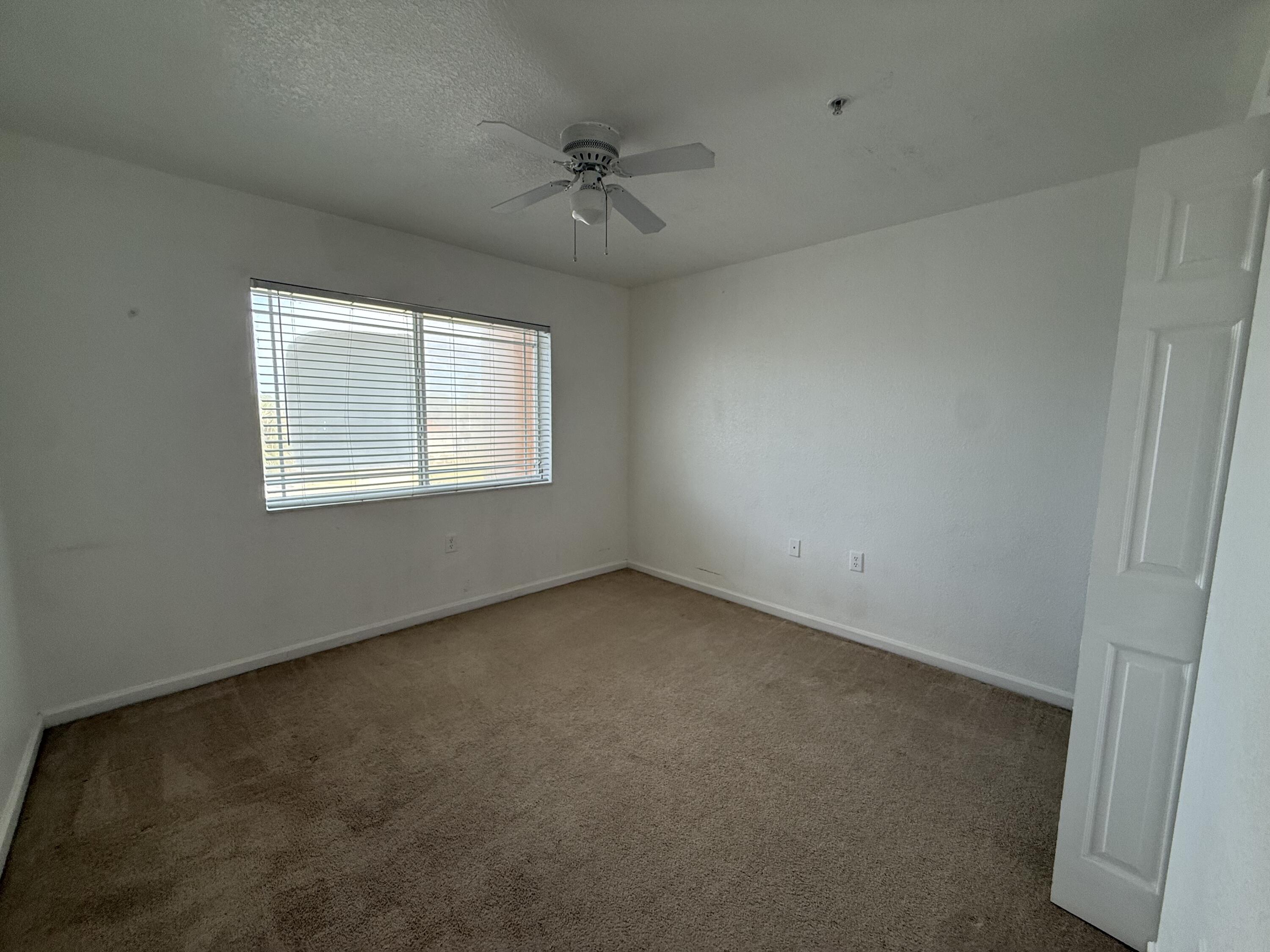 301 Southwest Palm Drive, Unit 305 Port St. Lucie, FL 34986 - Photo 11 of 17 an empty room with a window