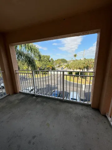 a view of a balcony with an outdoor space
