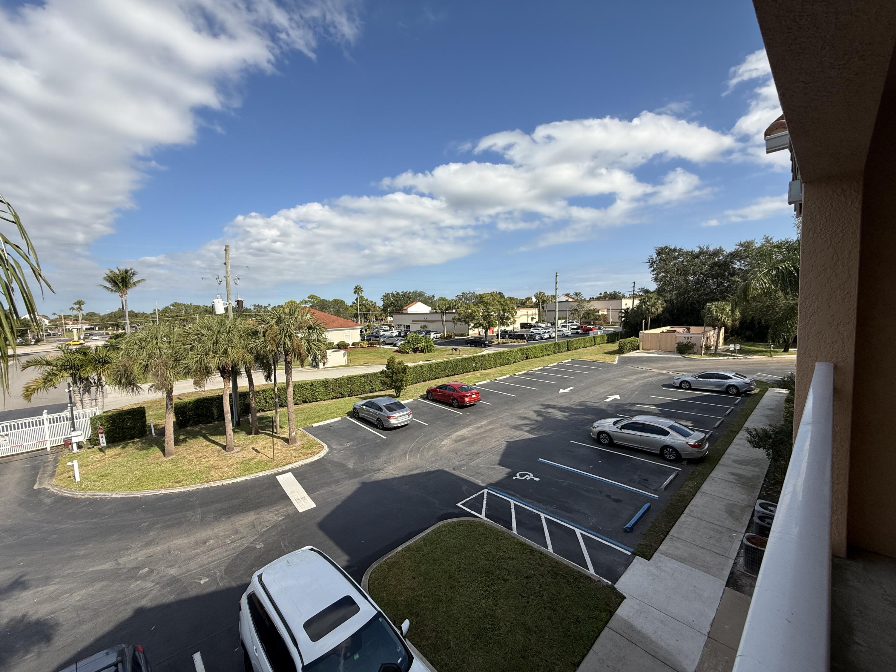 301 Southwest Palm Drive, Unit 305 Port St. Lucie, FL 34986 - Photo 16 of 17 an outdoor space with furniture