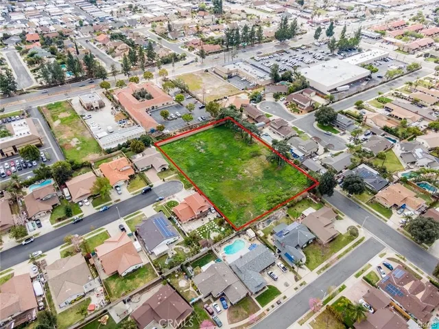 an aerial view of a city with lots of residential buildings