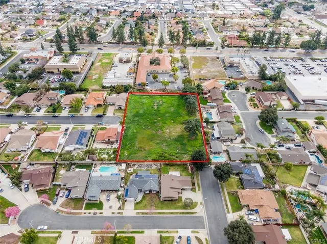 an aerial view of residential building with parking space