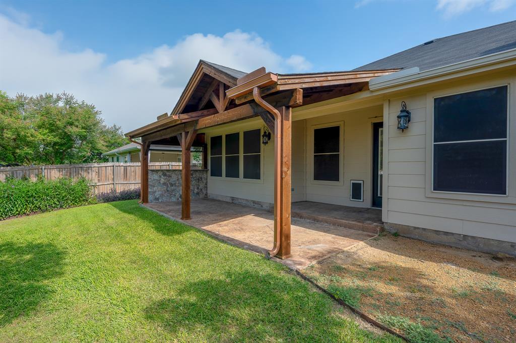 1070 Shepard Lane Lavon, TX 75166 - Photo 27 of 29 a view of a house with a yard