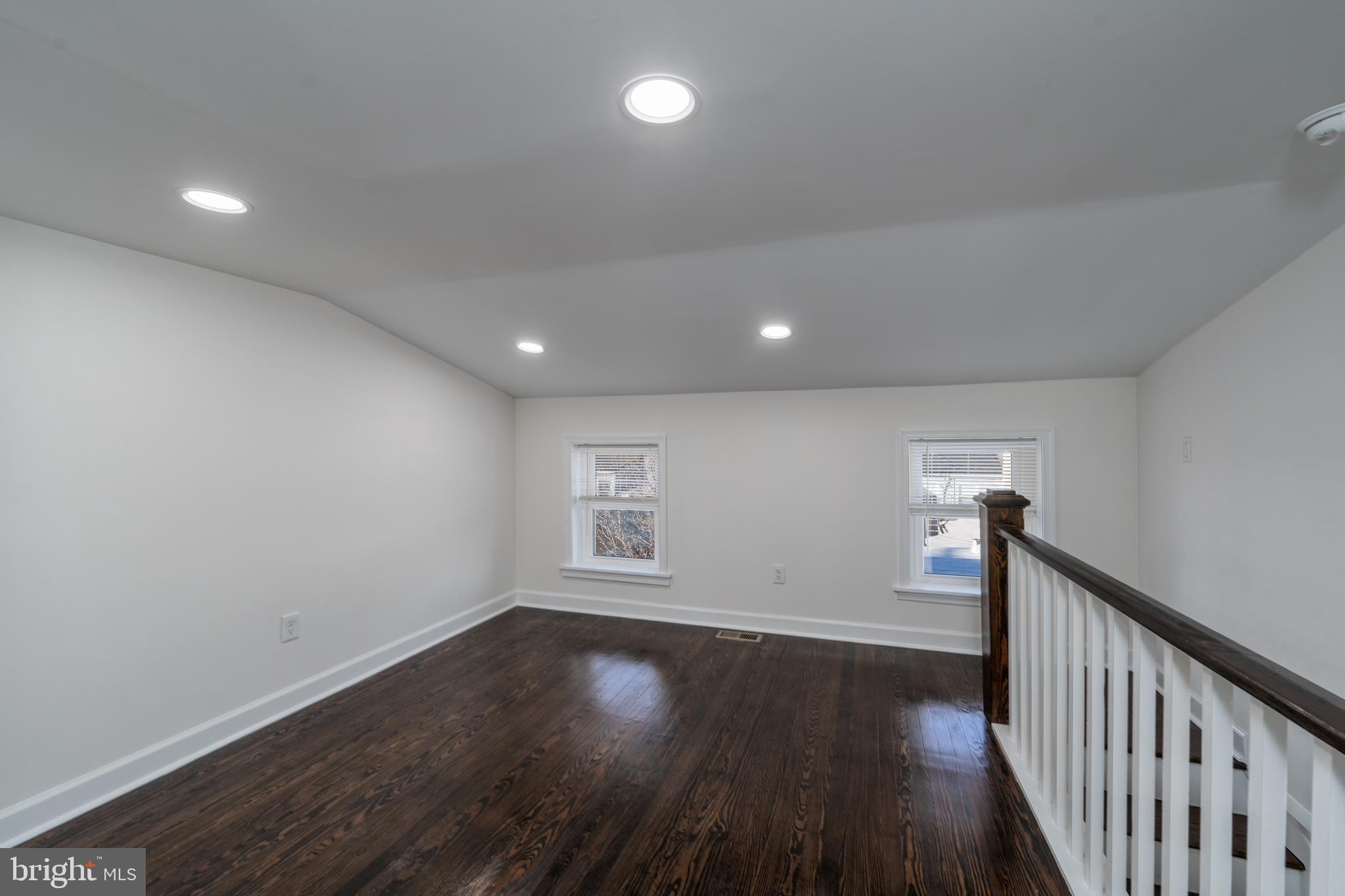 116 South Durham Street Baltimore, MD 21231 - Photo 18 of 28 wooden floor in an empty room with a window