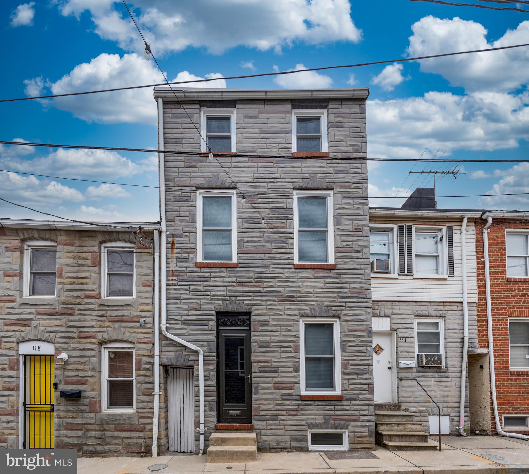 116 South Durham Street Baltimore, MD 21231 - Photo 2 of 28 a front view of a building