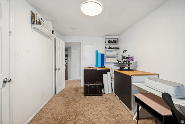 1215 8th Street Ogden, UT 84404 - Photo 29 of 39 Carpeted interior room featuring white walls and a flush-mount ceiling light