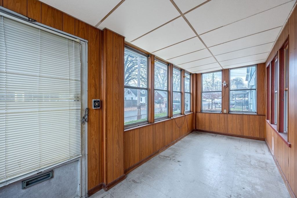 97 Oklahoma Street Springfield, MA 01104 - Photo 12 of 25 a view of an empty room with a window