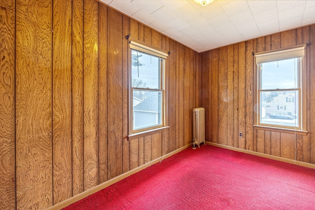 97 Oklahoma Street Springfield, MA 01104 - Photo 15 of 25 an empty room with windows