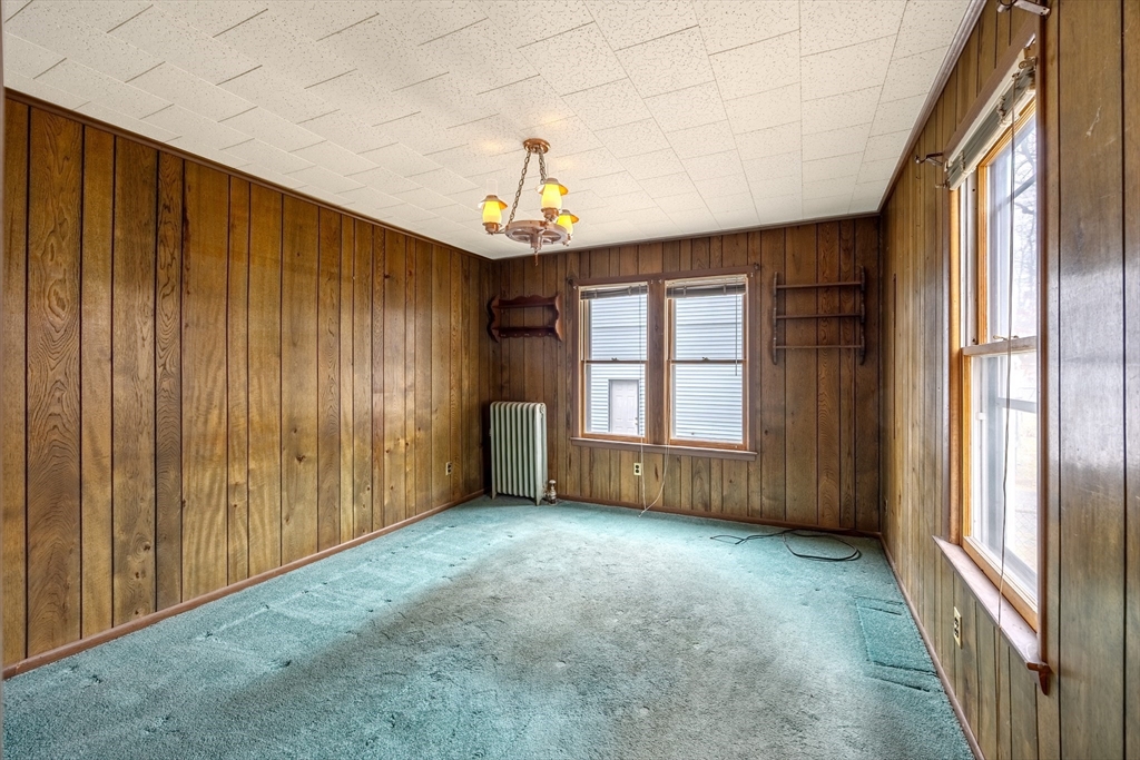 97 Oklahoma Street Springfield, MA 01104 - Photo 7 of 25 a view of an empty room with a window