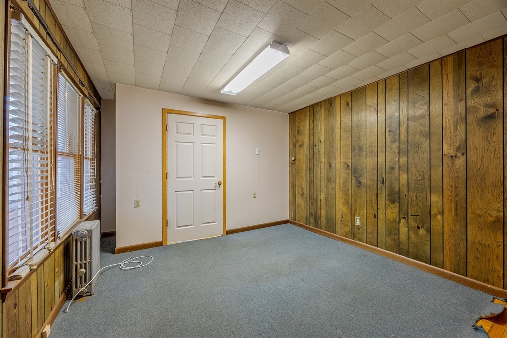 97 Oklahoma Street Springfield, MA 01104 - Photo 9 of 25 a view of an empty room with a window