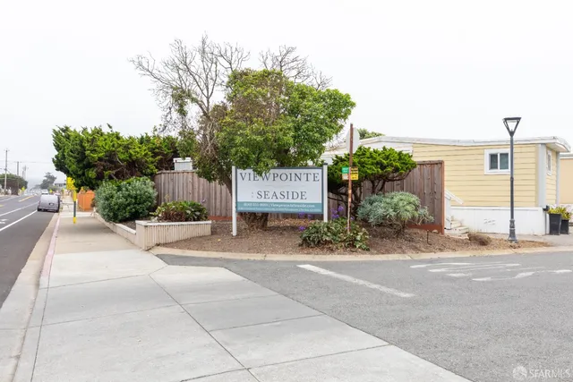 a front view of a house with a garage