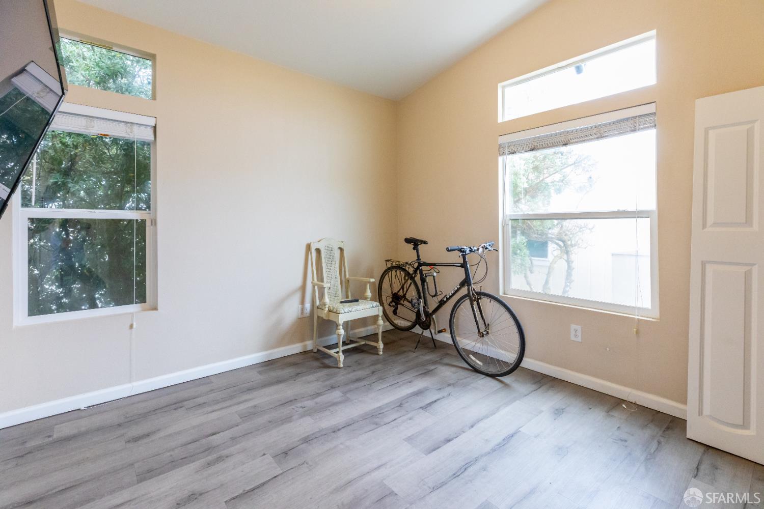 125 1st Avenue Pacifica, CA 94044 - Photo 22 of 55 a view of wooden floor in a room next to a window