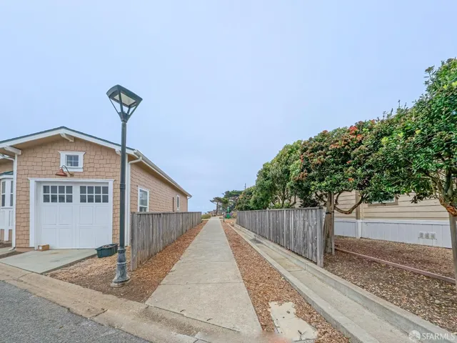 a view of a lake with a yard