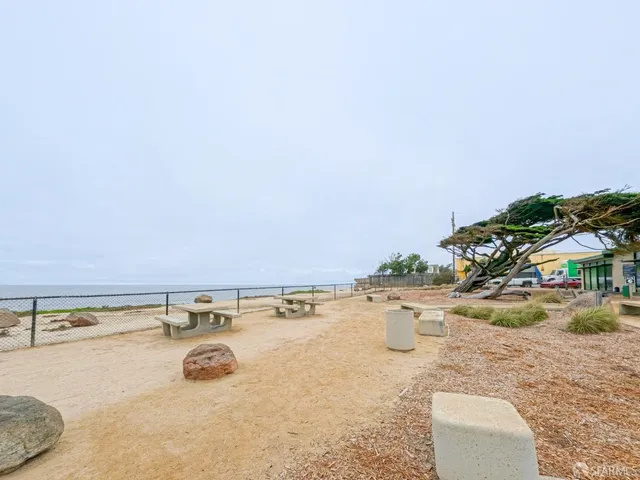 a view of ocean with an outdoor space