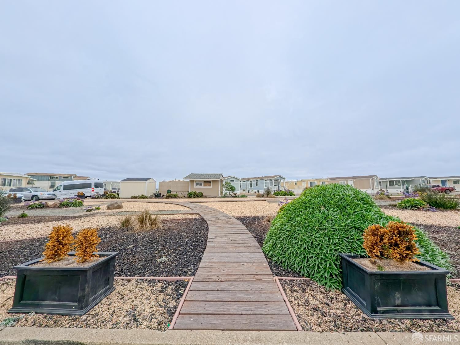 125 1st Avenue Pacifica, CA 94044 - Photo 39 of 55 a view of a terrace with lawn chairs and potted plants