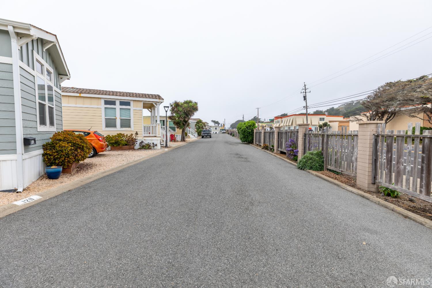 125 1st Avenue Pacifica, CA 94044 - Photo 48 of 55 a view of a street with a cars parked in front of it