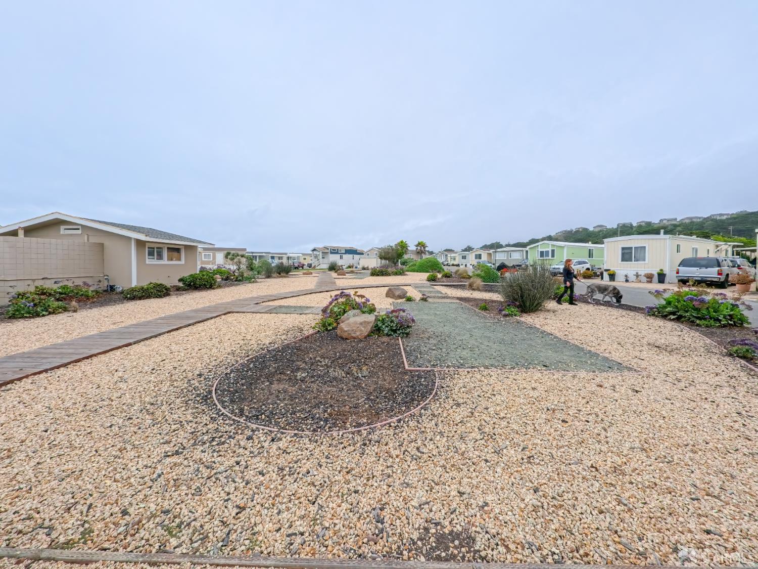 125 1st Avenue Pacifica, CA 94044 - Photo 49 of 55 a view of a road with a building in the background