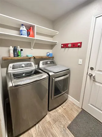 a utility room with dryer and washer