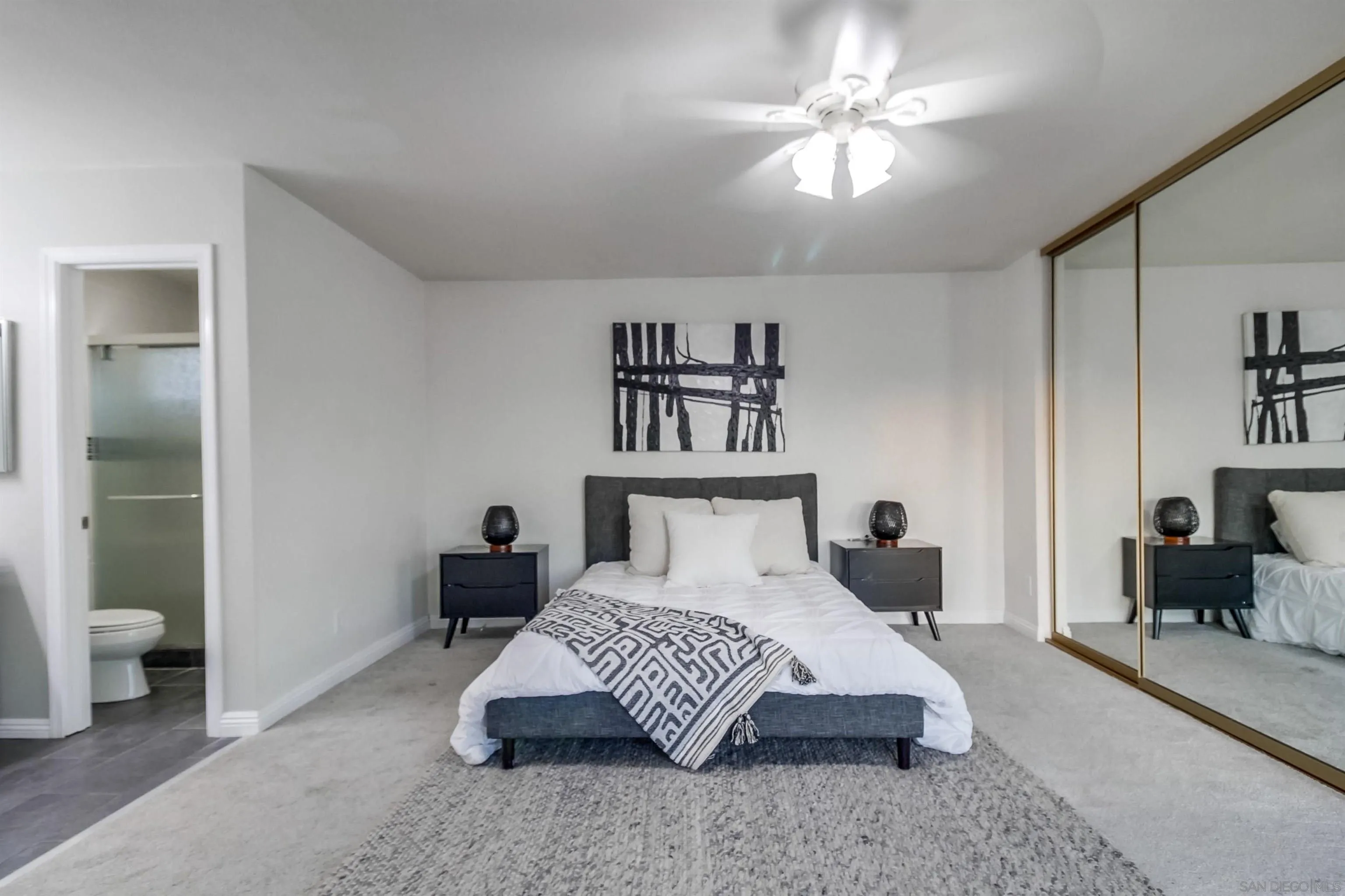 2351 Star Pine Drive Lemon Grove, CA 91945 - Photo 20 of 44 a bedroom with a bed and a chandelier