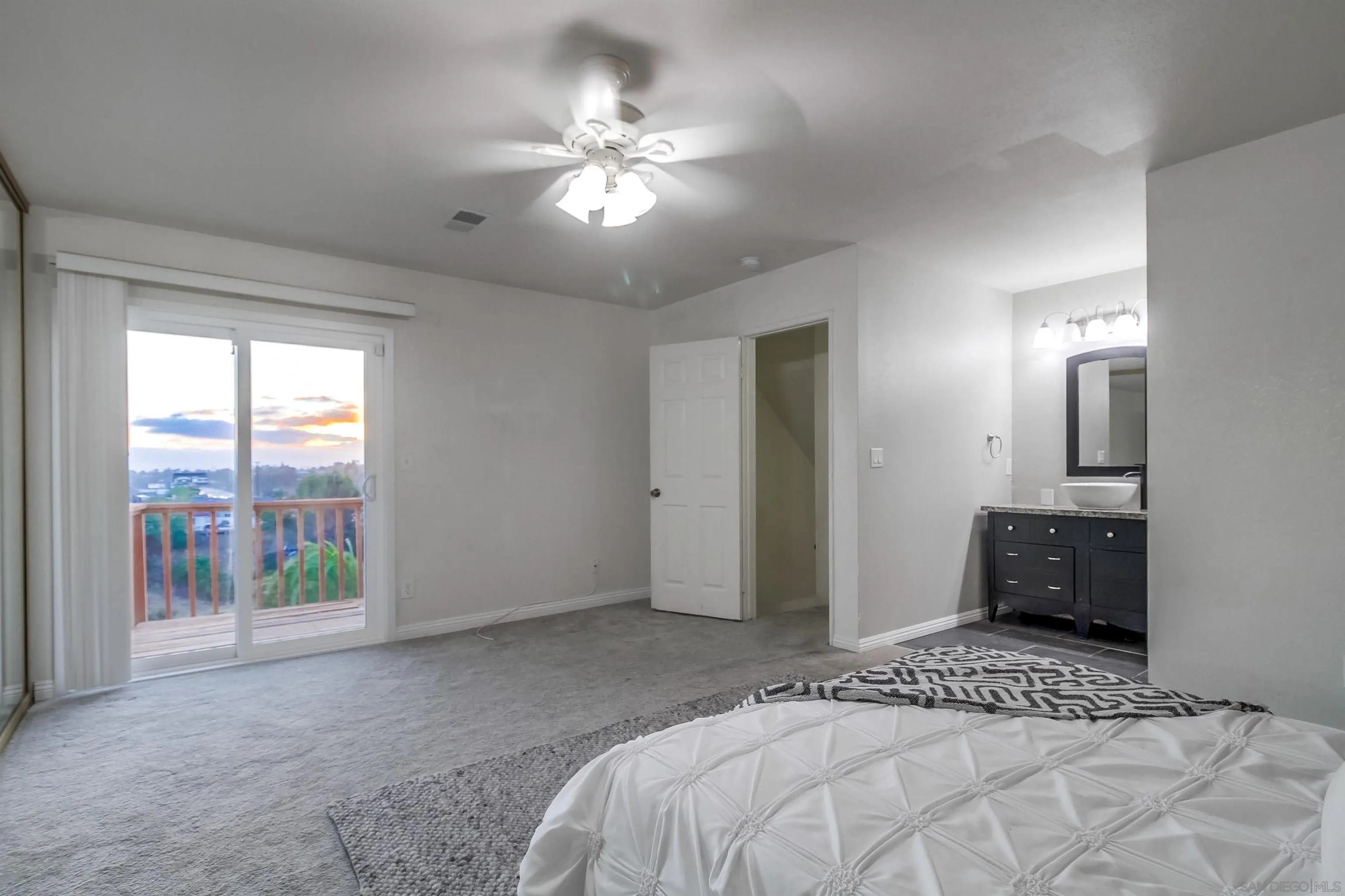 2351 Star Pine Drive Lemon Grove, CA 91945 - Photo 22 of 44 a bedroom with a bed and a chandelier