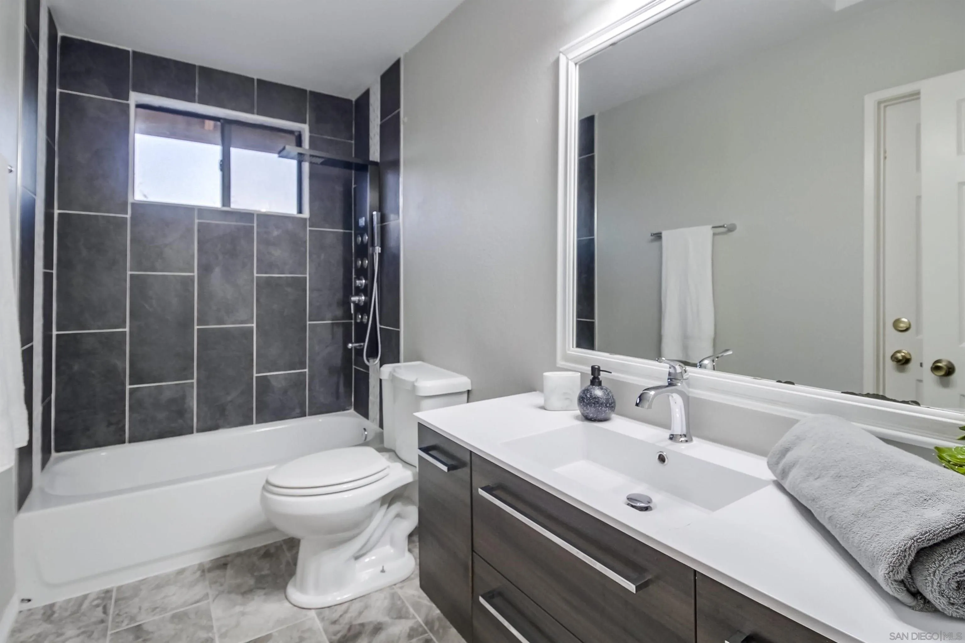 2351 Star Pine Drive Lemon Grove, CA 91945 - Photo 35 of 44 a bathroom with a sink toilet and shower