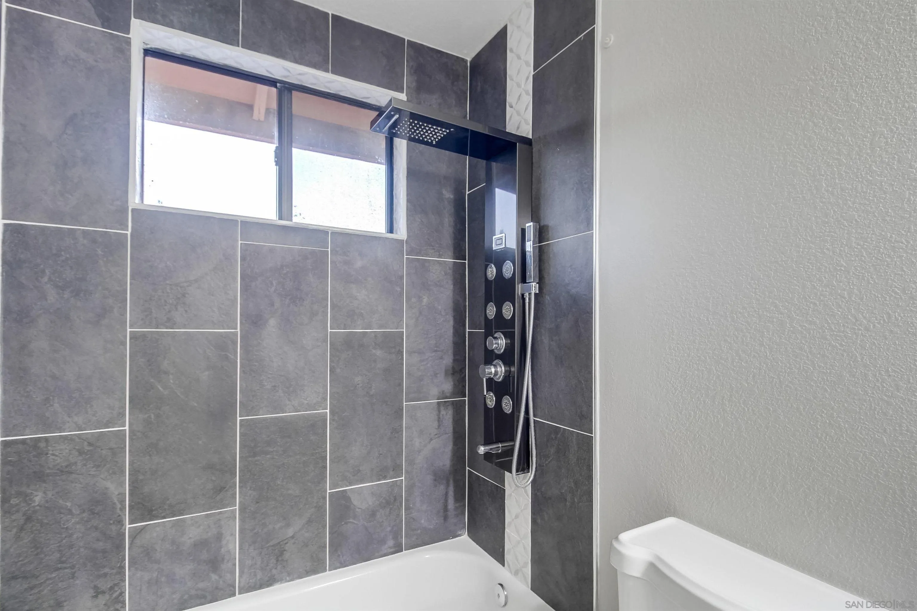 2351 Star Pine Drive Lemon Grove, CA 91945 - Photo 36 of 44 a bathroom with a toilet and a shower