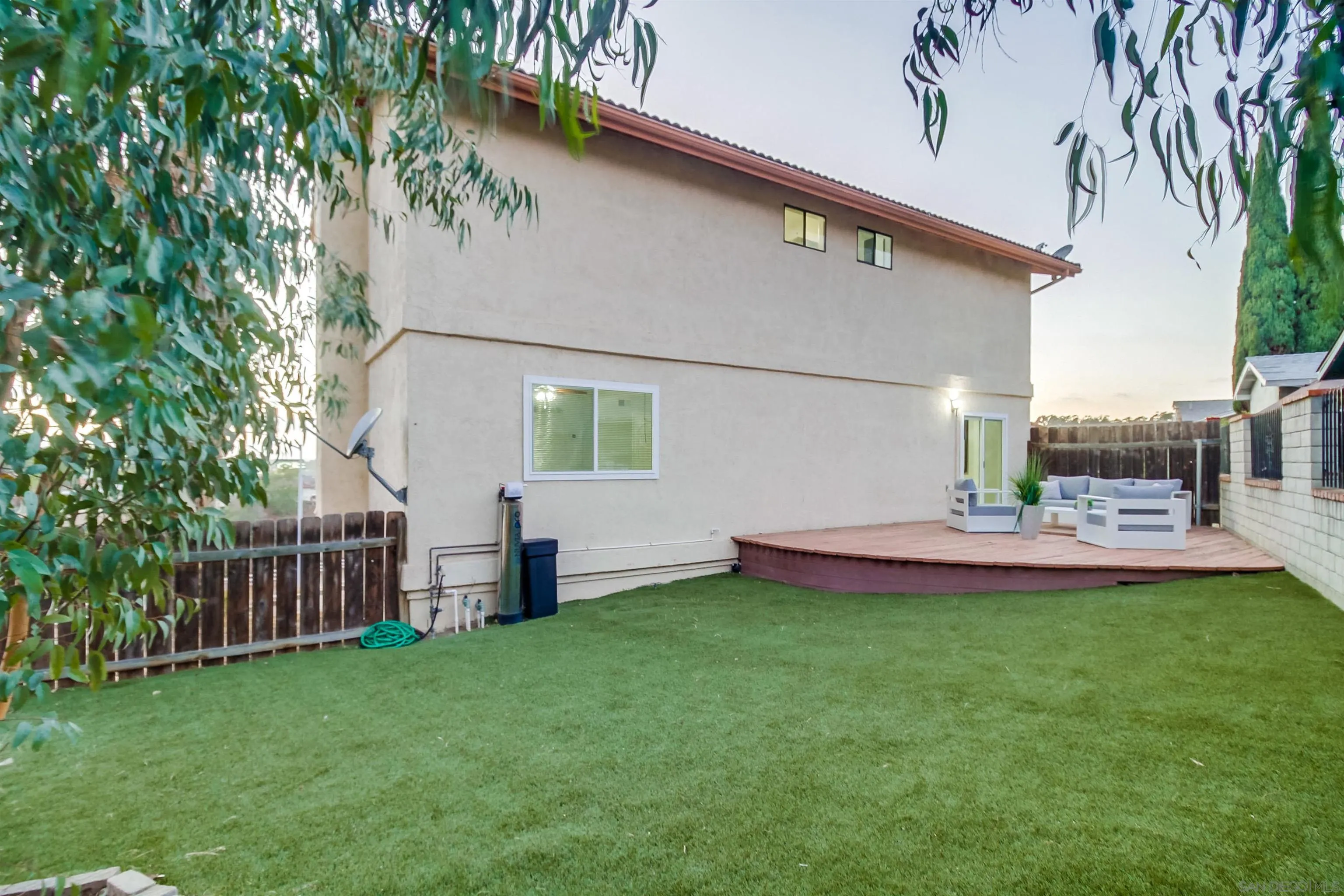 2351 Star Pine Drive Lemon Grove, CA 91945 - Photo 40 of 44 a view of a house with backyard and a table