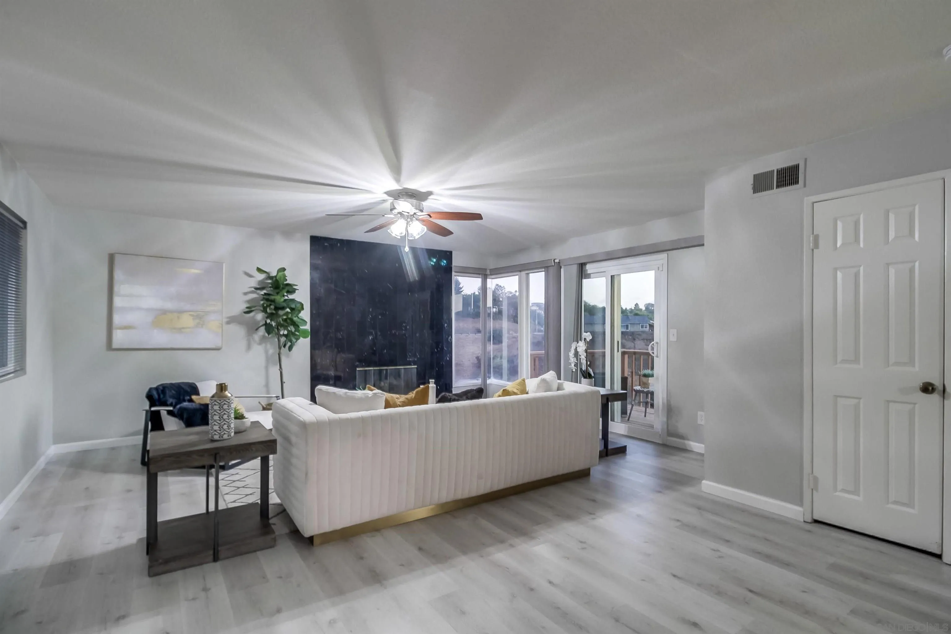 2351 Star Pine Drive Lemon Grove, CA 91945 - Photo 8 of 44 a living room with furniture and a chandelier