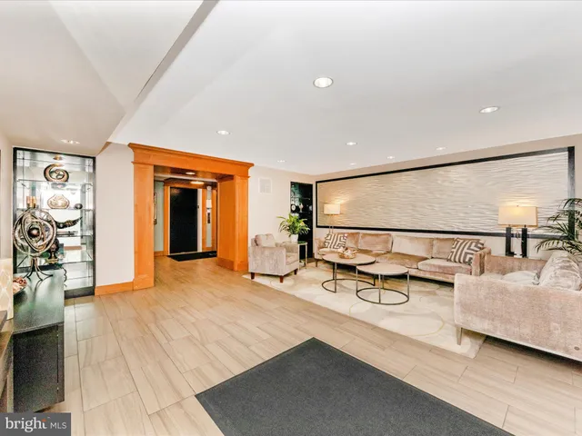 a view of a livingroom with furniture and a rug
