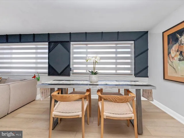a kitchen with a sink cabinets and window