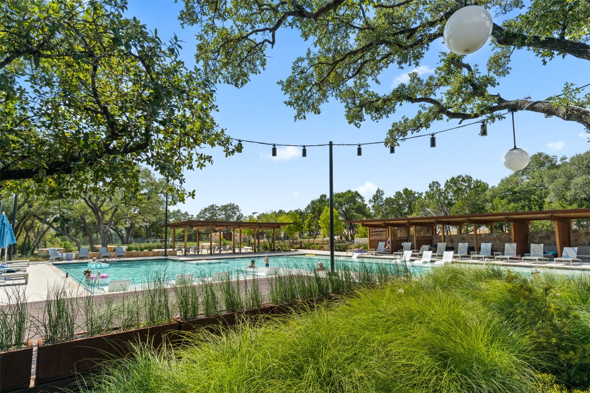 432 Clear Springs Road Georgetown, TX 78628 - Photo 23 of 27 Community pool featuring a patio area