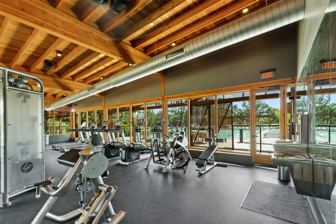 432 Clear Springs Road Georgetown, TX 78628 - Photo 24 of 27 Workout area featuring a wooden ceiling with exposed beams