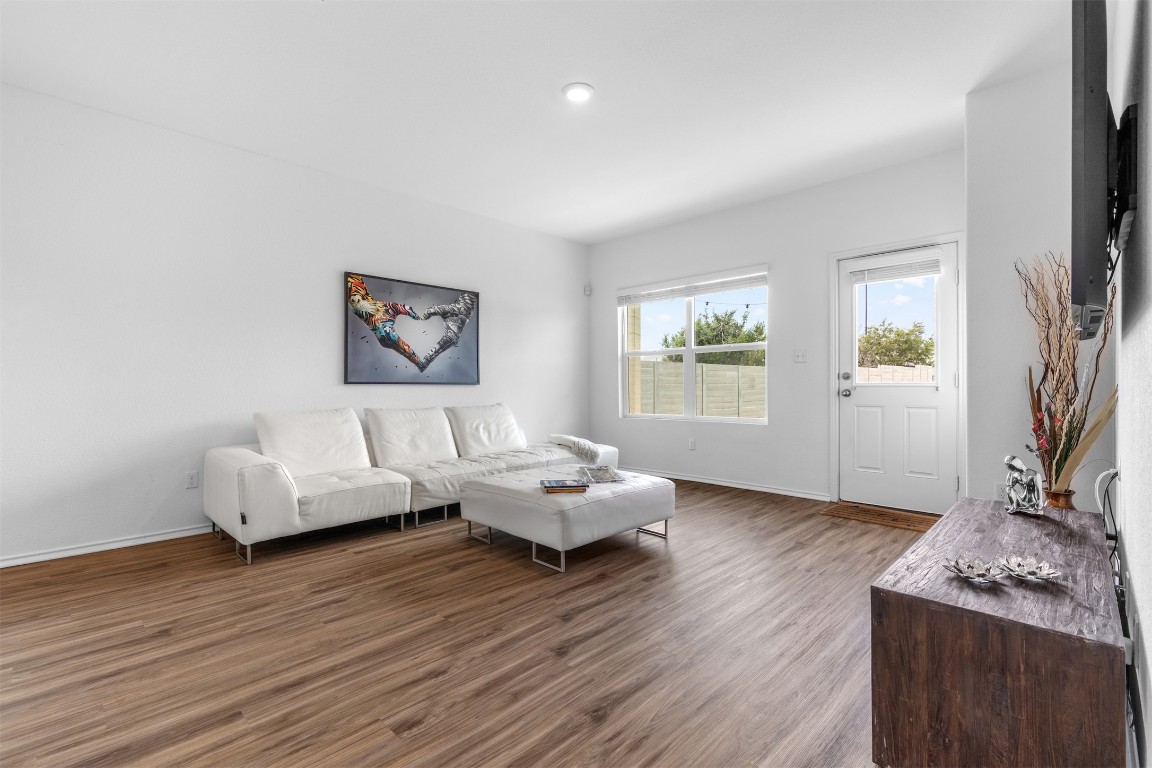 432 Clear Springs Road Georgetown, TX 78628 - Photo 5 of 27 Living area with wood finished floors and baseboards