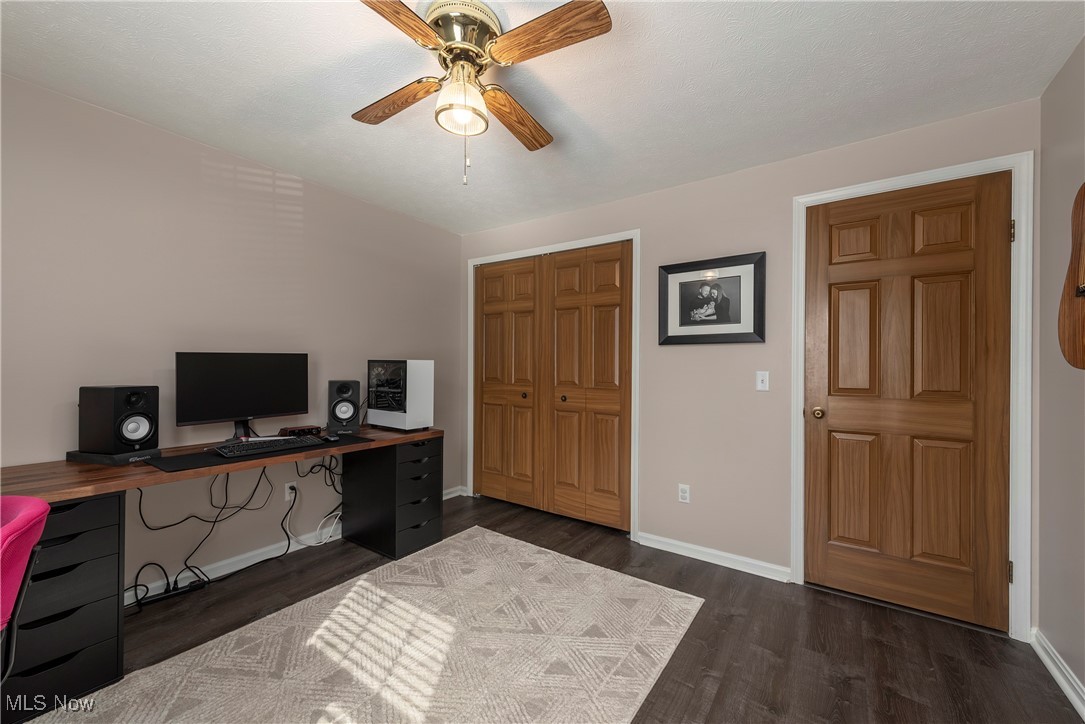 580 Orchardview Road Independence, OH 44131 - Photo 28 of 44 Office area featuring dark wood-style floors, a ceiling fan, and baseboards
