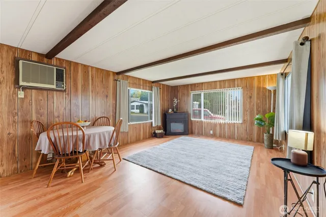a view of a livingroom with furniture and front door