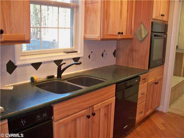 65 Olde Footpath Road Aylett, VA 23009 - Photo 5 of 12 Den/Family/Great Room - Beautiful Family Room with Gleaming Hardwood Floors, 9 foot ceilings throughout and all open to Dining Area and Kitchen!