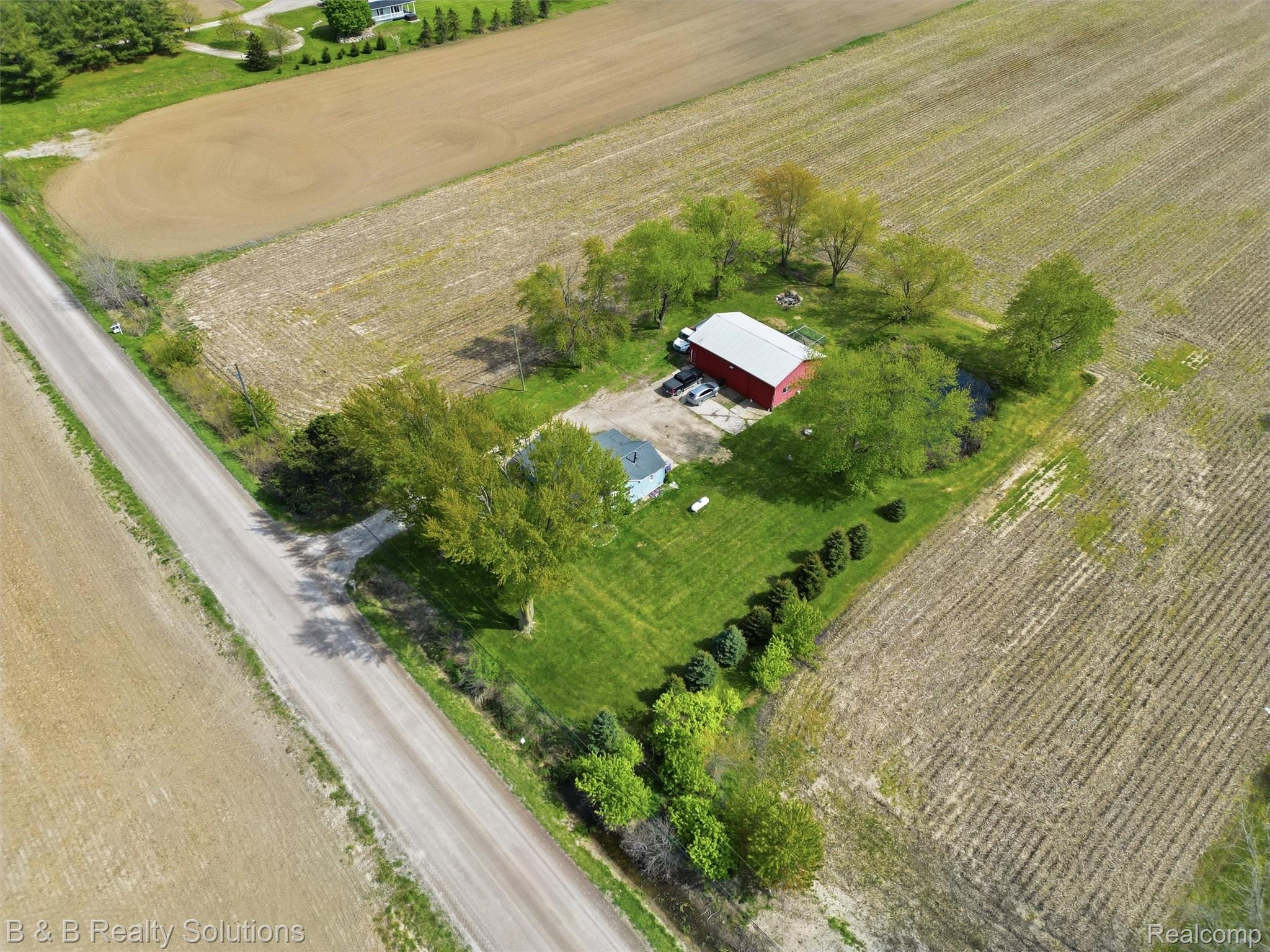 21900 Bordman Road Armada, MI 48005 - Photo 15 of 55 View of rural area featuring rows of crops