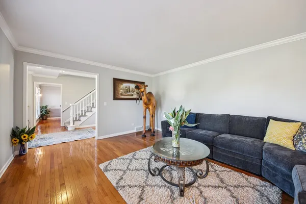 a bathroom with a double vanity sink a mirror and shower