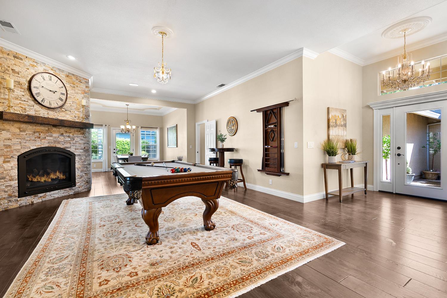 8300 Auburn Folsom Road Granite Bay, CA 95746 - Photo 11 of 45 a living room with furniture a fireplace and a table