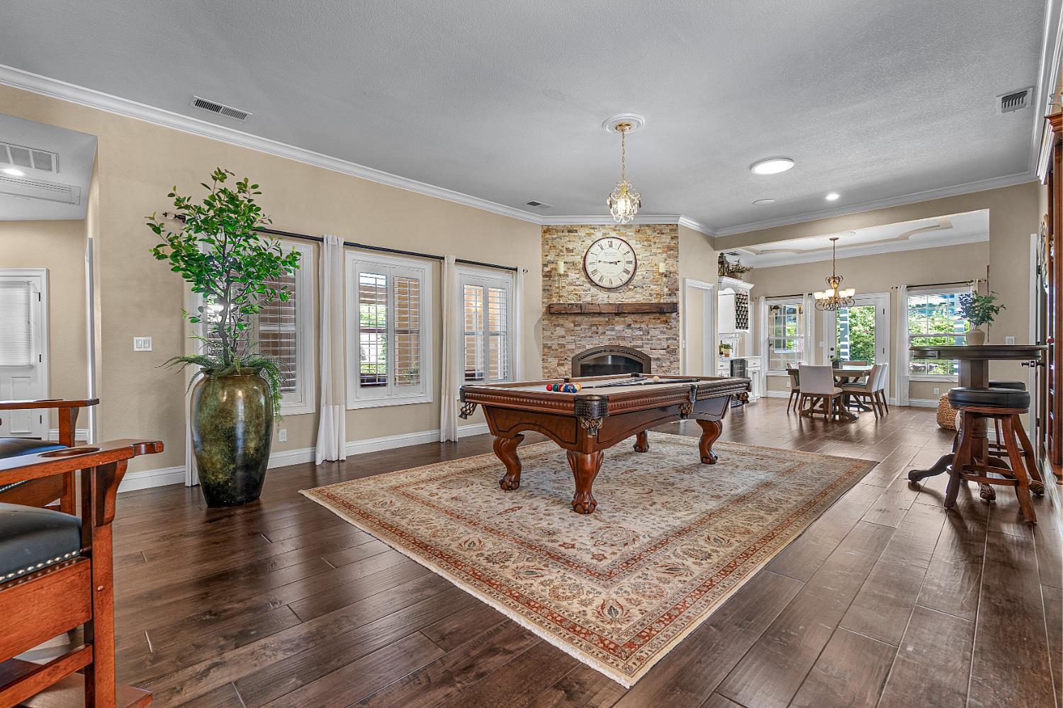 8300 Auburn Folsom Road Granite Bay, CA 95746 - Photo 12 of 45 a living room with furniture and a wooden floor